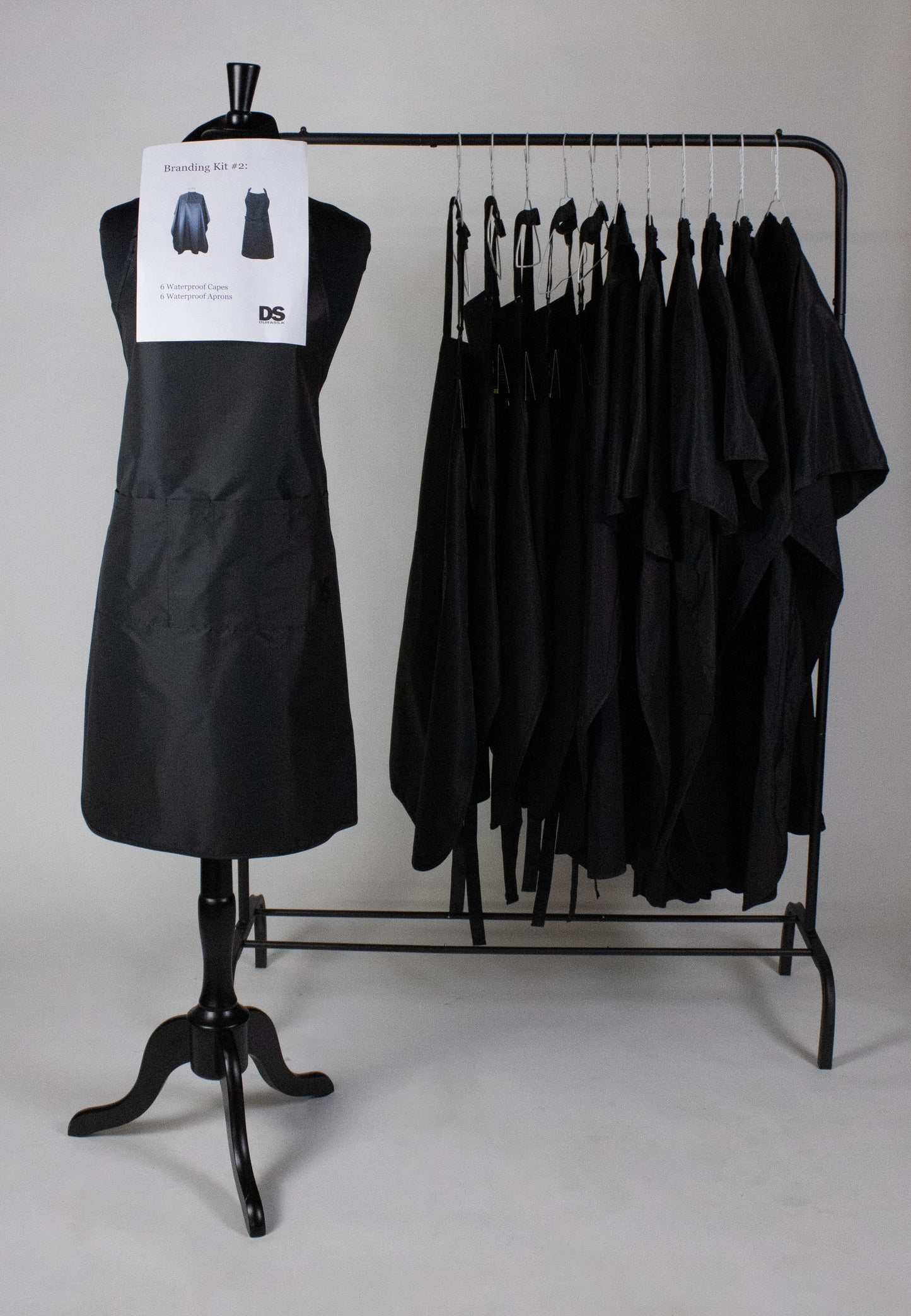 BRANDING STUDIO KIT 2: 6 WATERPROOF CAPES / 6 WATERPROOF APRONS WITH LOGO